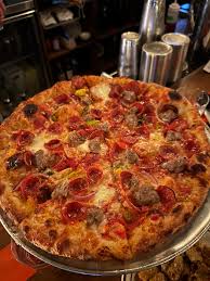 Tiny Champions signature dishes Fennel Sausage PizzaHot Honey PizzaRadiator Pasta